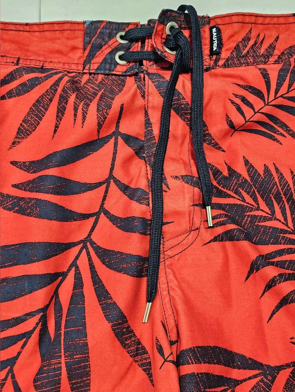 Nautica Red Swim Shorts with Black and Light Blue Tropical Leaf Print Large